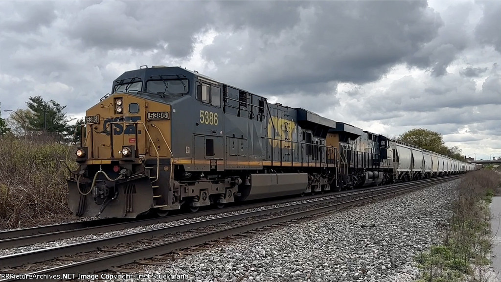 CSX 5386 leads M214.